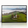 Large abstract wall art depicting a Slovenian landscape in muted earth tones, framed in black acrylic.