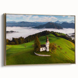 Framed canvas of a vintage-style Slovenian landscape painting, featuring colorful art on a black background.