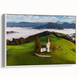 Framed canvas featuring a vintage-style landscape painting of a Slovenian scenery in muted earth tones.