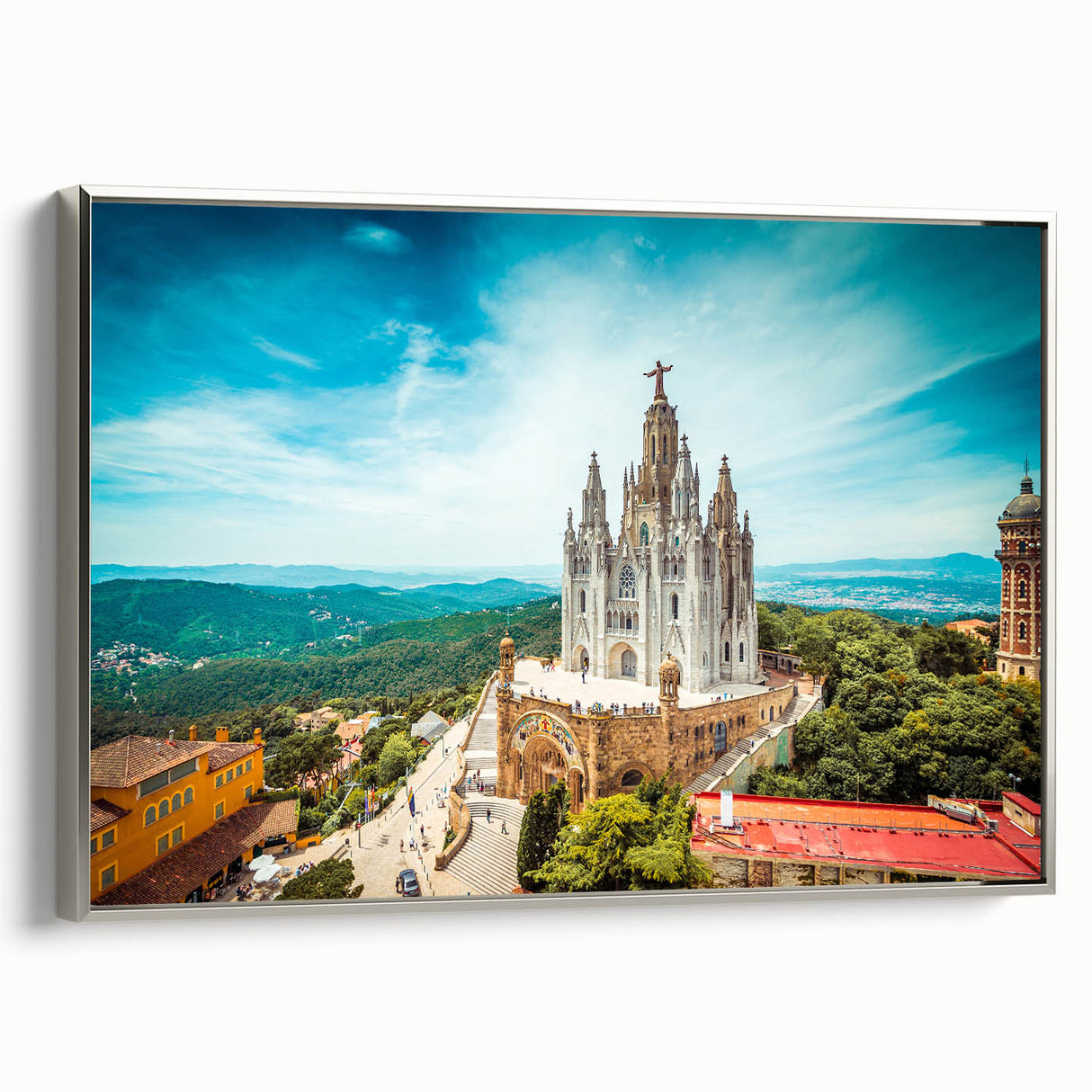 Vintage poster art of Barcelona landscape on framed canvas, featuring colorful art in black tones.