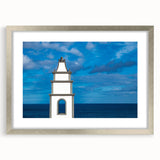 Extra large abstract art print of a textured European scenery in muted earth tones, framed in silver.