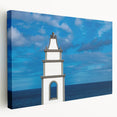 Large canvas print of a European coastal scene in vibrant blues and greens, ideal for kitchen wall art.