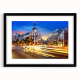 Extra large abstract art print of Madrid with vibrant colors on textured canvas, framed in black.