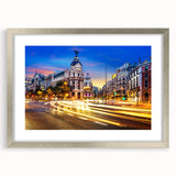 Textured art of abstract Madrid cityscape in muted earth tones on a silver-framed mat, suitable for bedroom decor.