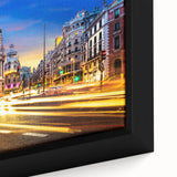 Extra large framed canvas of Madrid scenery in black with colorful, textured details, ideal for living room decor.
