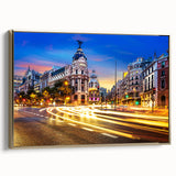 Framed canvas depicting a vintage-style Madrid landscape in muted gold and black tones, suitable for bedroom decor.