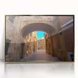 Framed acrylic print of a mid-century modernist Valencia cityscape in muted gold and brown tones.