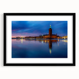 Extra large colorful abstract art print of Stockholm scenery, in black frame with mat, ideal for living room decor.