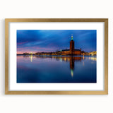 Extra large abstract art print of Stockholm scenery in textured gold frame, ideal for living room decor.