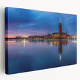 Side view of a large, stretched canvas depicting a serene Stockholm cityscape in soft blue and gray tones.