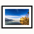 Extra large abstract art print of Geneva scenery in vibrant colors on a textured canvas, framed in black.