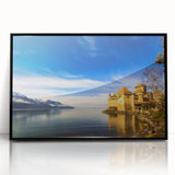 Large abstract wall art of Geneva scenery in muted blues and greens on a black-framed acrylic.