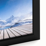 Close-up of black framed canvas featuring a textured, colorful Swiss landscape, ideal for extra large living room wall art.