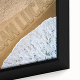 Framed canvas of a textured black wall art depicting Cabo San Lucas scenery, featuring vibrant colorful accents.