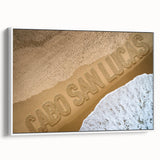 Vintage poster art of Cabo San Lucas with vibrant colors on a white-framed canvas, ideal for living room decor.