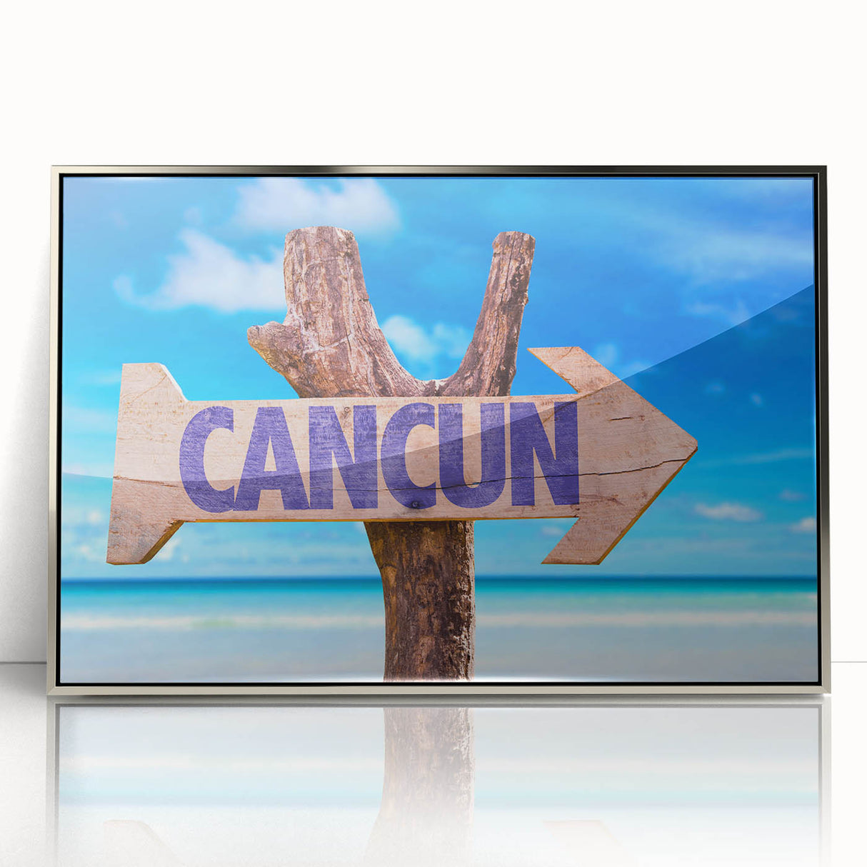 Mid-century modernist art depicting Cancun scenery on silver-framed acrylic, with vibrant blue and green tones.