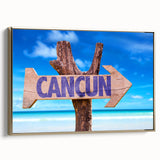 Framed canvas wall art depicting a vintage-style Cancun landscape in black and gold tones, ideal for bedroom decor.