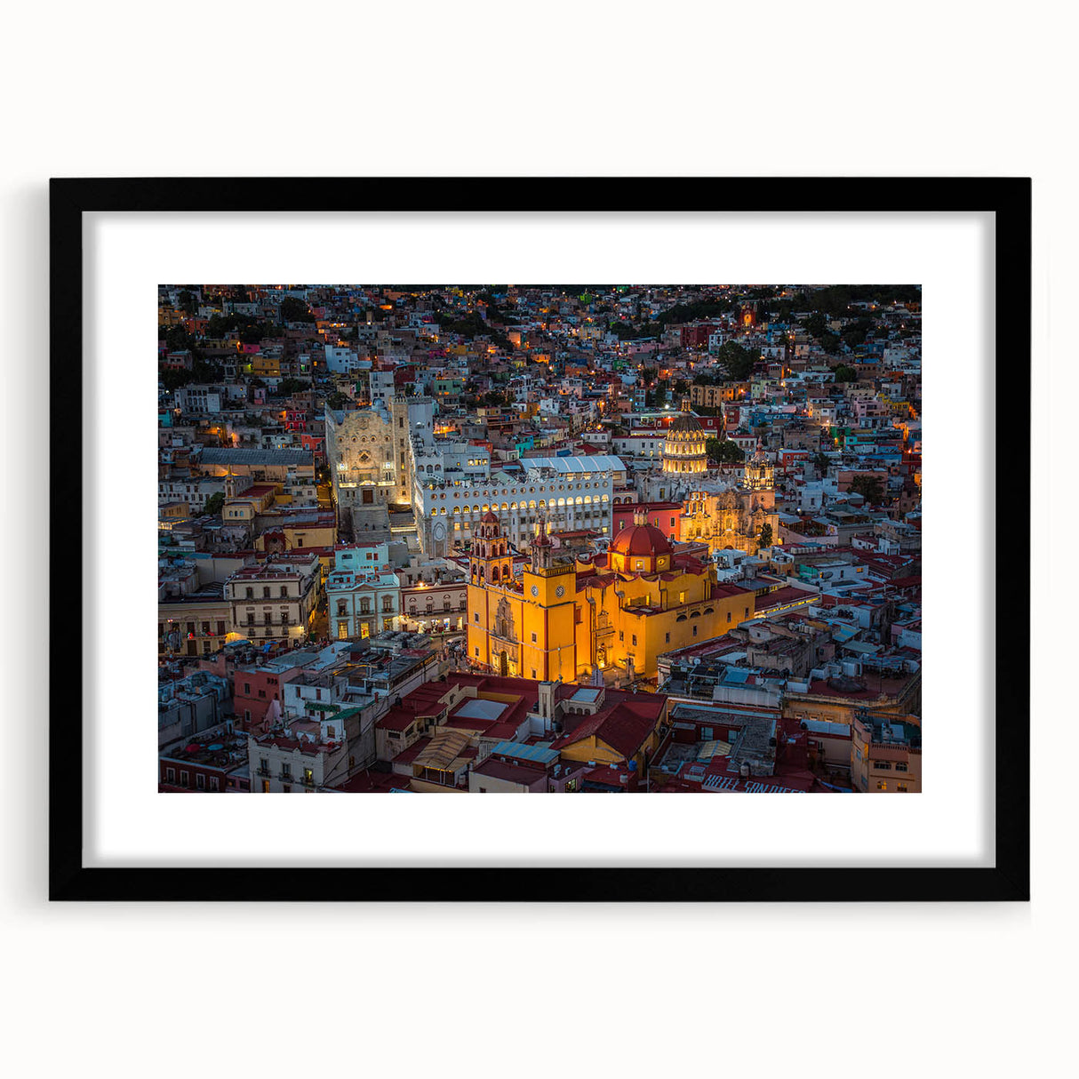 Extra large abstract art print of Guanajuato, featuring vibrant, textured colors on a framed canvas.