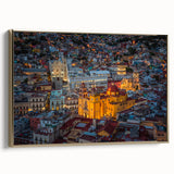 Framed canvas depicting a vintage-style landscape of Guanajuato, Mexico in black and gold tones, ideal for bedroom wall art.