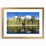 Extra large abstract art print of Oaxaca scenery in textured style, with vibrant earth tones, framed in gold.