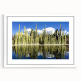 Abstract art print of Oaxaca scenery in muted earth tones on a white-framed mat, suitable for dining room decor.
