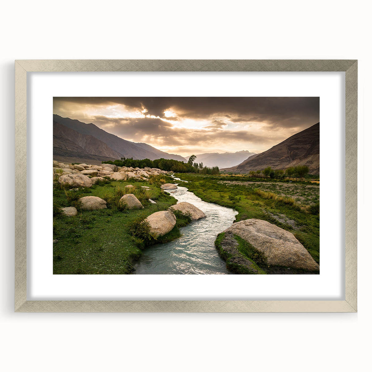 Textured abstract art print of a Middle Eastern scenery in muted earth tones, framed in silver, ideal for bedroom art.