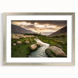 Textured abstract art print of a Middle Eastern scenery in muted earth tones, framed in silver, ideal for bedroom art.