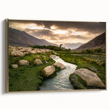 Framed canvas featuring a vintage-style landscape painting of a Middle Eastern scenery in black and gold tones.