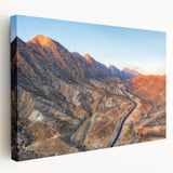 Stretched canvas wall art depicting a serene Middle Eastern landscape with earthy tones, ideal for kitchen wall art.