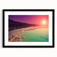 Extra large abstract art print of the Dead Sea in vibrant blues and oranges, framed with a black mat.