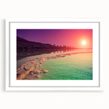 Abstract art print of the Dead Sea in muted blue and beige tones, framed with a white mat, suitable for dining room decor.