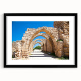 Abstract art print of Jerusalem in vibrant colors on textured canvas, framed in black, ideal for living room decor.