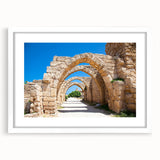 Abstract art print of Jerusalem skyline in muted earth tones on a framed white mat, suitable for dining room decor.