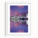 Abstract art print of Tel Aviv skyline in muted blue and white tones on a framed canvas, suitable for dining room decor.