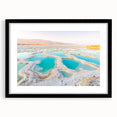 Colorful abstract art print of a Middle Eastern scenery on a large textured canvas, framed in black.