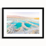 Colorful abstract art print of a Middle Eastern scenery on a large textured canvas, framed in black.