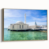 Framed canvas featuring a vintage-style landscape painting of a Middle Eastern desert in muted gold and black tones.