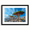 Abstract art print of a Middle Eastern landscape in vibrant colors on a large, framed canvas, suitable for living room decor.
