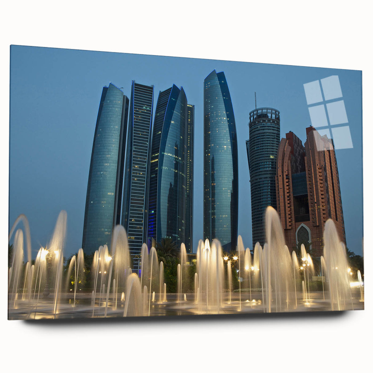 Large abstract wall art of Abu Dhabi skyline in muted blue and gray tones on acrylic glass.
