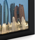 Close-up of extra large framed canvas featuring a textured, colorful Abu Dhabi skyline on a black background.