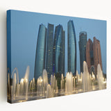 Side view of a stretched canvas featuring a detailed Abu Dhabi skyline in muted earth tones, suitable for kitchen wall art.
