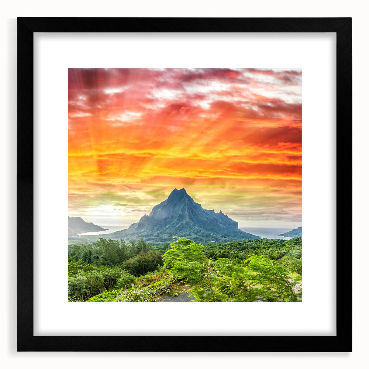 Extra large, colorful abstract art print of French Polynesia scenery, in a black frame, ideal for living room decor.