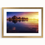 Extra large abstract art print of a Tahitian landscape in textured tones of blue and green on a gold-framed canvas.