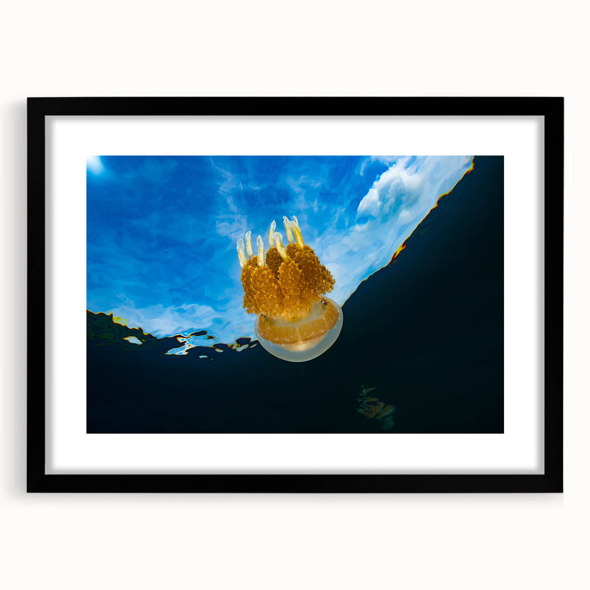 Extra large, colorful abstract art print of oceanic scenery in a black frame with mat, suitable for living room decor.
