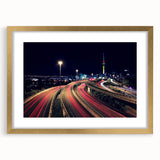 Abstract art print of Auckland's skyline in textured shades of blue and gray on a large framed canvas.
