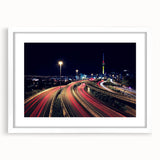 Abstract art print of Auckland scenery in muted blue and green hues on a white framed canvas, ideal for dining room decor.