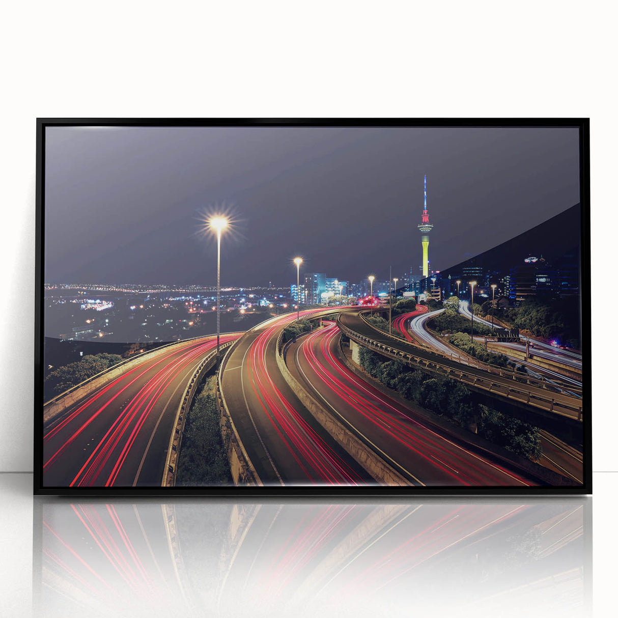 Large abstract wall art depicting Auckland's skyline in muted gray and blue tones on a framed acrylic.