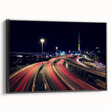 Black and white framed canvas of Auckland landscape, ideal for bedroom wall decor.