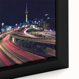 Extra large framed canvas featuring a textured depiction of Auckland's skyline in black with colorful art accents.