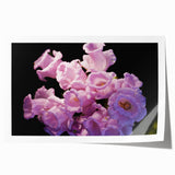 Extra large wall art featuring line art flowers in muted green and white hues on a rolled print.